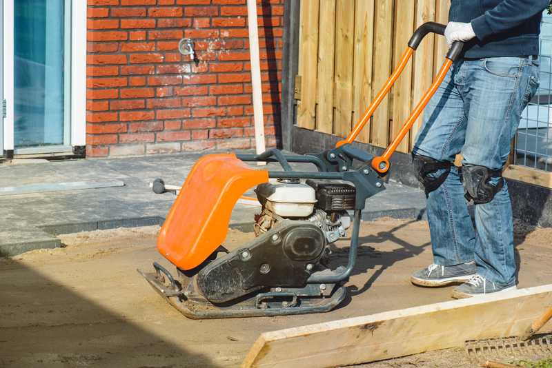 the plate compactor speeds up and simplifies the job at hand